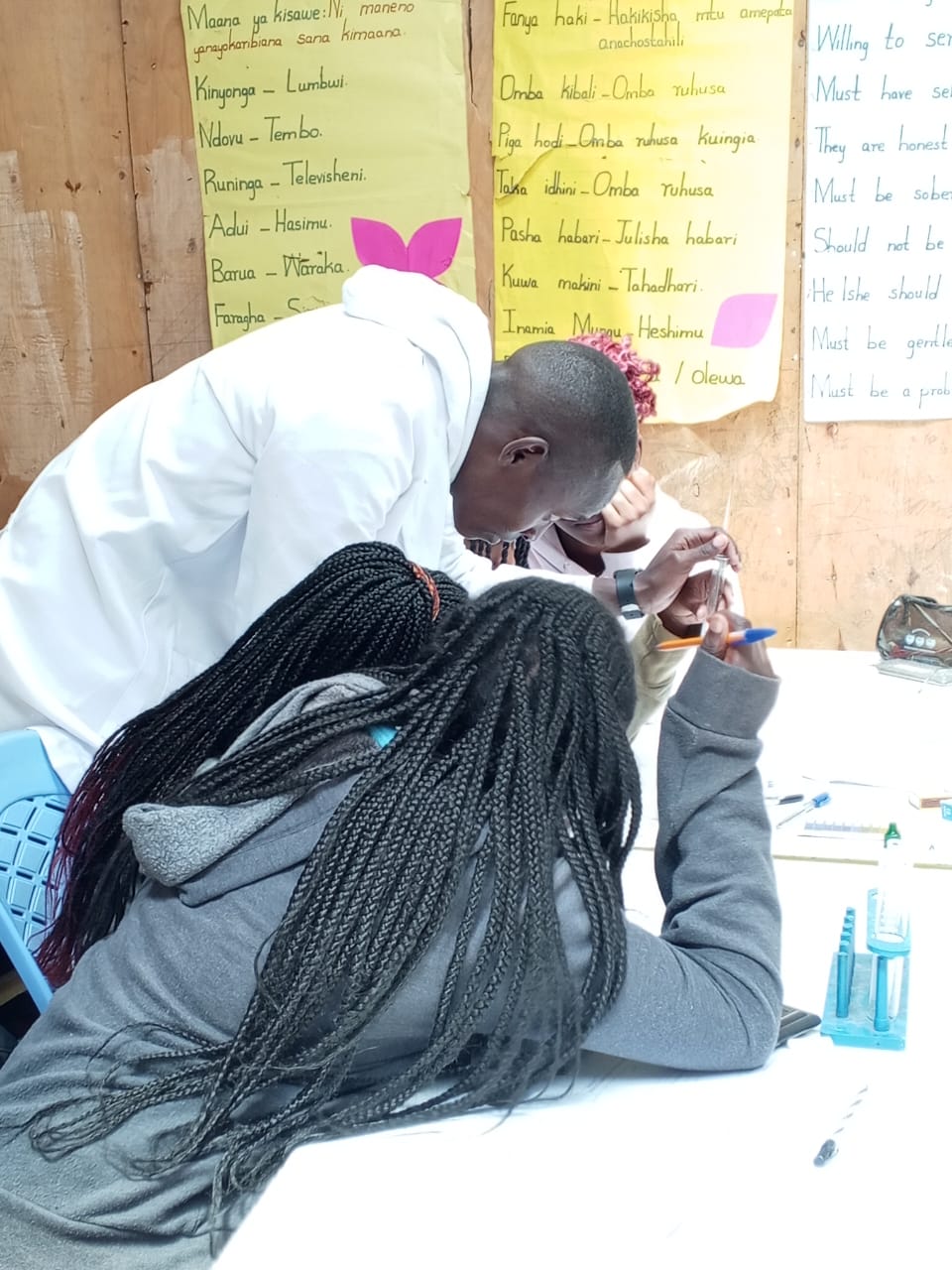 CBC learners doing hands-on practical tasks in a Peak Campus classroom